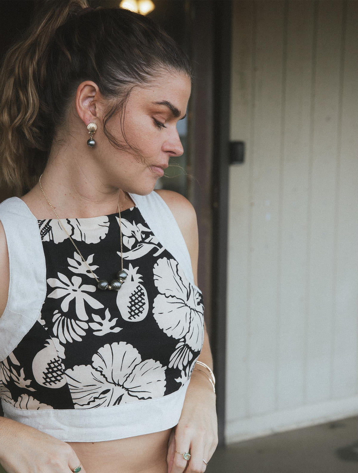 Model in an aloha print top