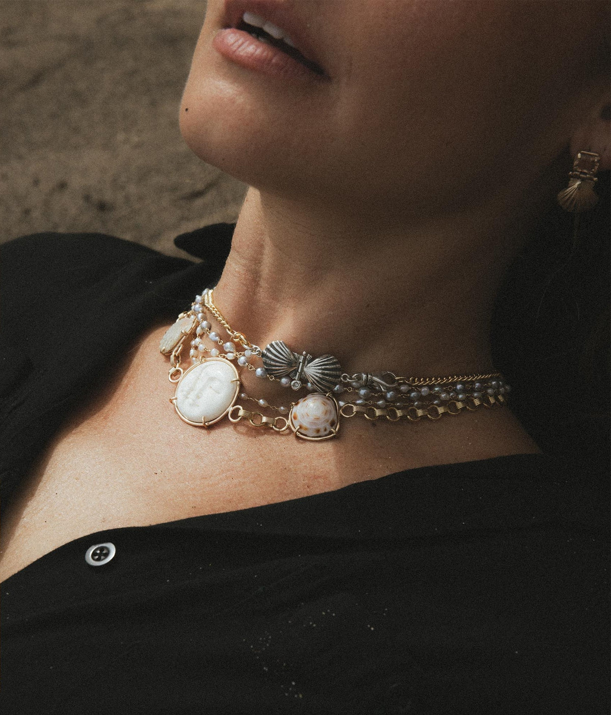 Shell necklace on a black top