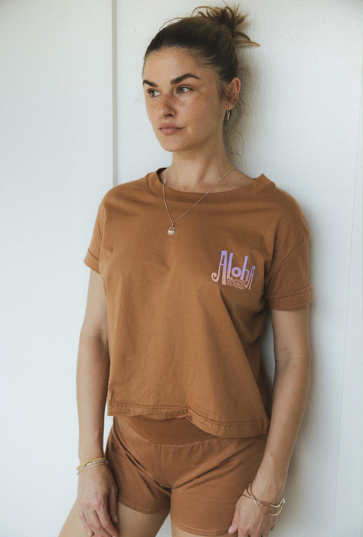 Model in a brown set