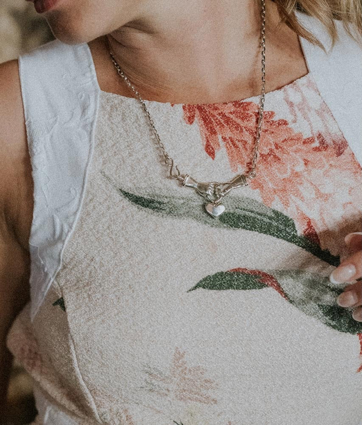 Pinafore top with a necklace