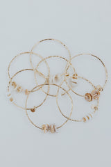 wings hawaii ti leaf bangles triple puka shell thumbnail