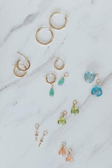 Loose charms for hoops: emerald, aquamarine, peridot, and imperial topaz, and daggers