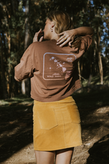 Wings Hawaii model wearing Oversized Cropped Tee - Hawaii Map in brown - back  thumbnail