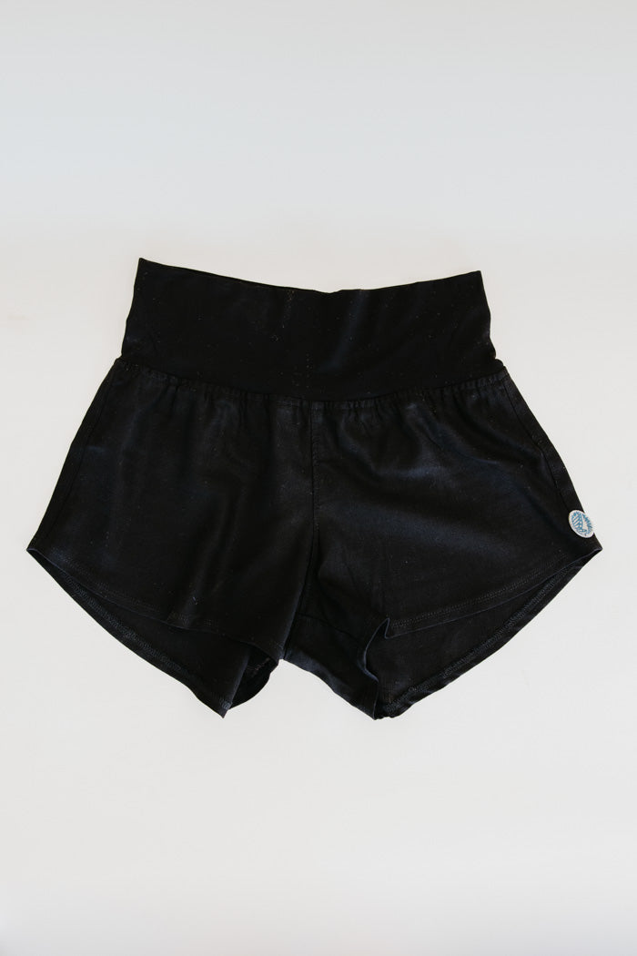 Wings Hawaii pau hana shorts in classic black. Soft, thick, stretchy waistband. Designed in Maui, sewn in Bali. Small batch, sustainable, unique apparel from Hawaii. Elevated loungewear. 
