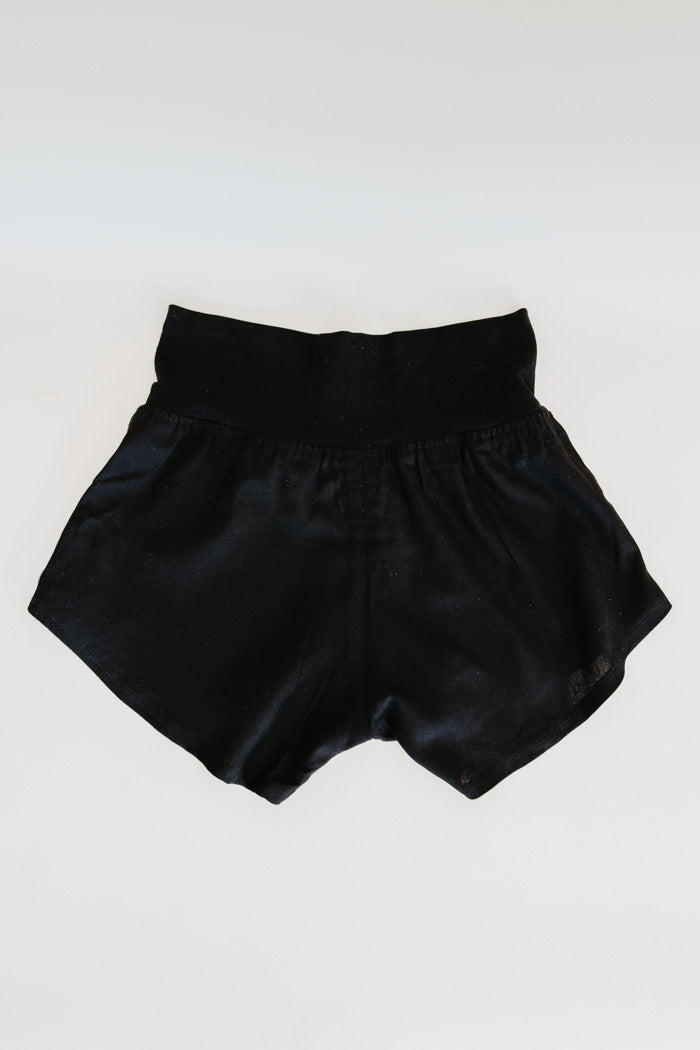 Wings Hawaii pau hana shorts in classic black. Soft, thick, stretchy waistband. Designed in Maui, sewn in Bali. Small batch, sustainable, unique apparel from Hawaii. Elevated loungewear. 