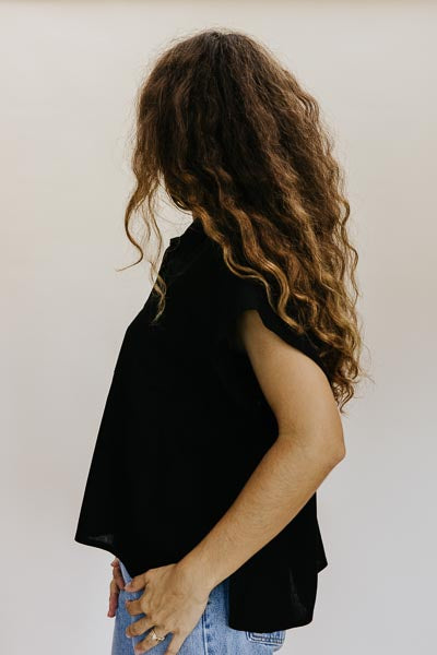 Wings Hawaii model wearing Classic Black Boxy Button-up