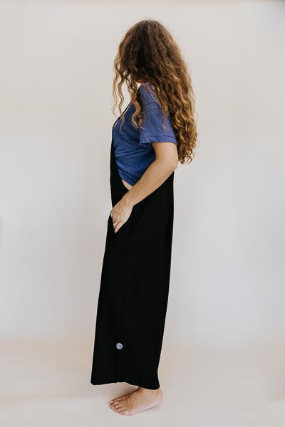 Wings Hawaii model wearing Sun Pocket Overalls in Black