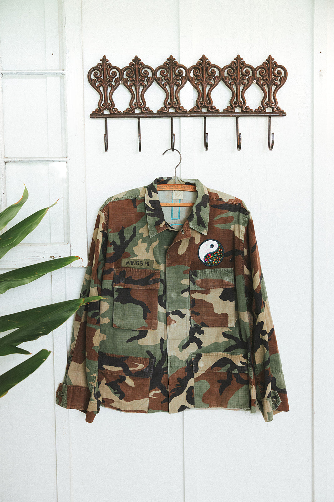 Wings Hawaii Evil Eye vintage army camouflage jacket. Upcycled and handcrafted with vintage aloha fabrics. Handmade in Maui. 