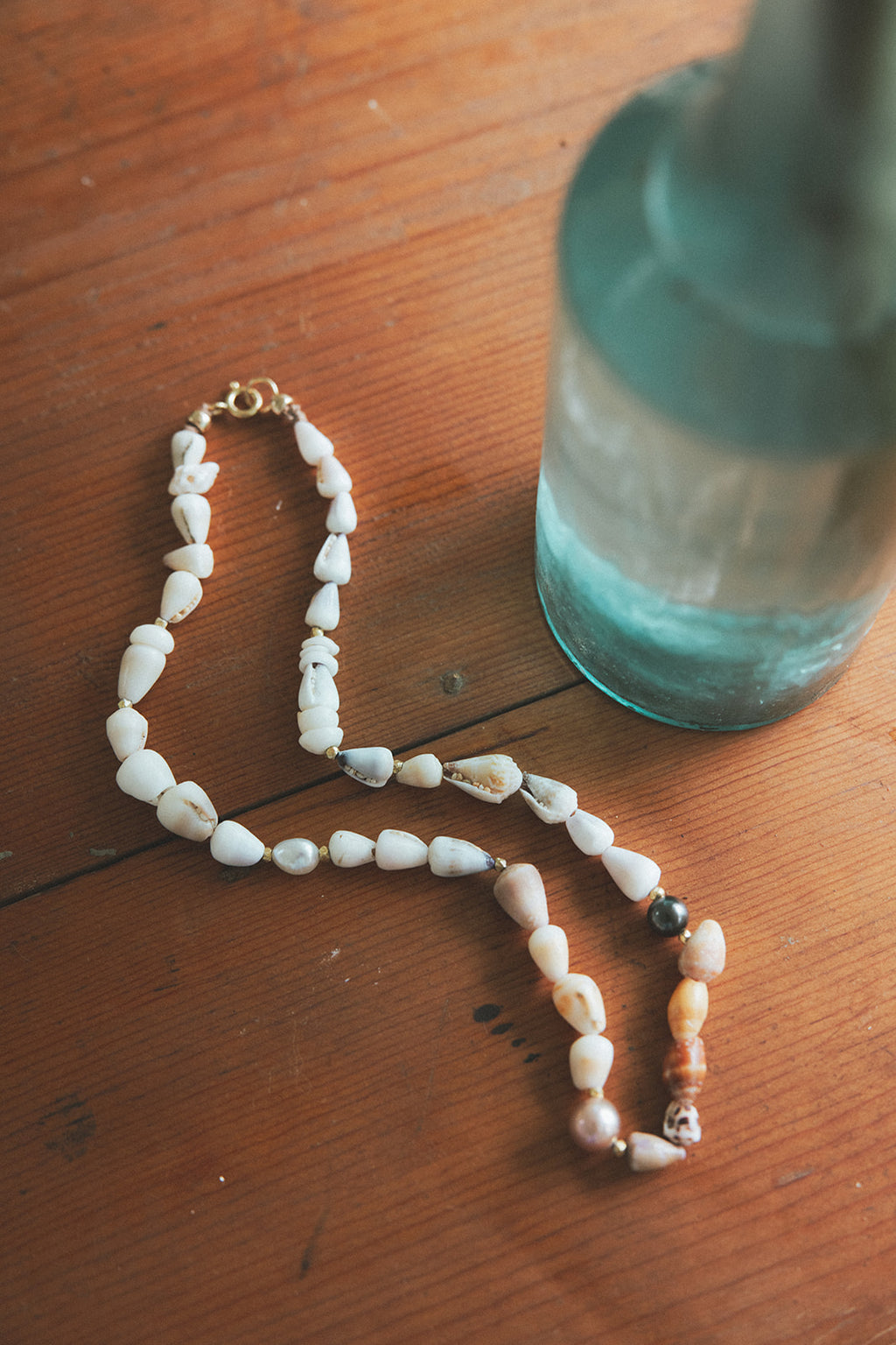 Wings Hawaii Mermaid's Treasure necklace with real Hawaiian seashells and Tahitian Pearls. Fine jewelry handcrafted in Maui. Exquisite, one of a kind, artisanal handmade piece. 