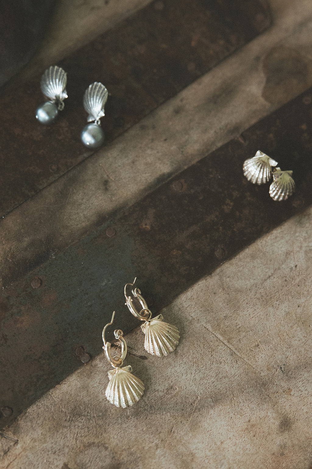 Wings Hawaii Forever Sunrise Shell stud earrings, available in solid 14k gold or sterling silver. Metal castings made from real Hawaiian sunrise shells. Fine jewelry handcrafted with aloha in Maui. 