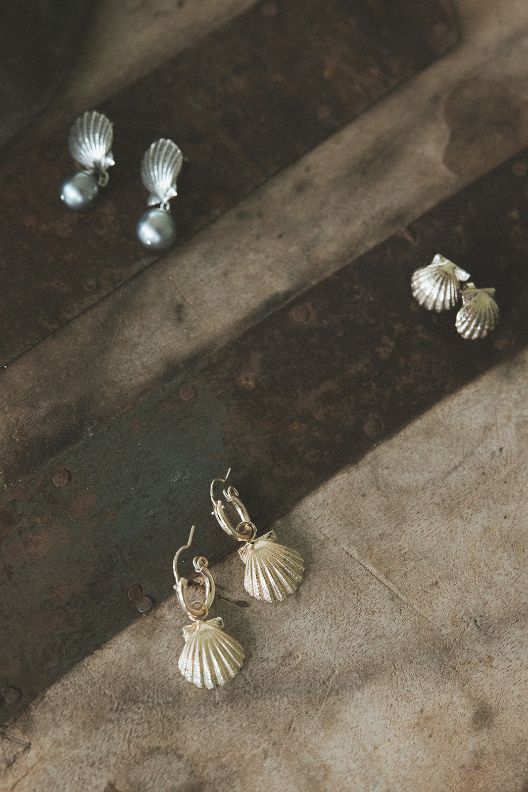 Wings Hawaii Forever Sunrise Shell stud earrings, available in solid 14k gold or sterling silver. Metal castings made from real Hawaiian sunrise shells. Fine jewelry handcrafted with aloha in Maui. 