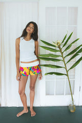 Wings Hawaii Patchwork Pau Hana Shorts in Tropic Rush. Handmade, one of a kind, upcycled vintage quilt fabric. Stretchy cotton waistband and back pocket. Made with aloha in Maui. Sustainable, small batch, slow fashion.  thumbnail