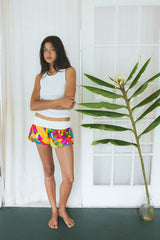 Wings Hawaii Patchwork Pau Hana Shorts in Tropic Rush. Handmade, one of a kind, upcycled vintage quilt fabric. Stretchy cotton waistband and back pocket. Made with aloha in Maui. Sustainable, small batch, slow fashion.  thumbnail