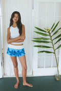 Wings Hawaii pau hana shorts in Hibiscus Blue. Retro tropical Hawaiian floral print on comfy french terry and bamboo cotton shorts. Original artwork designed in Maui. 