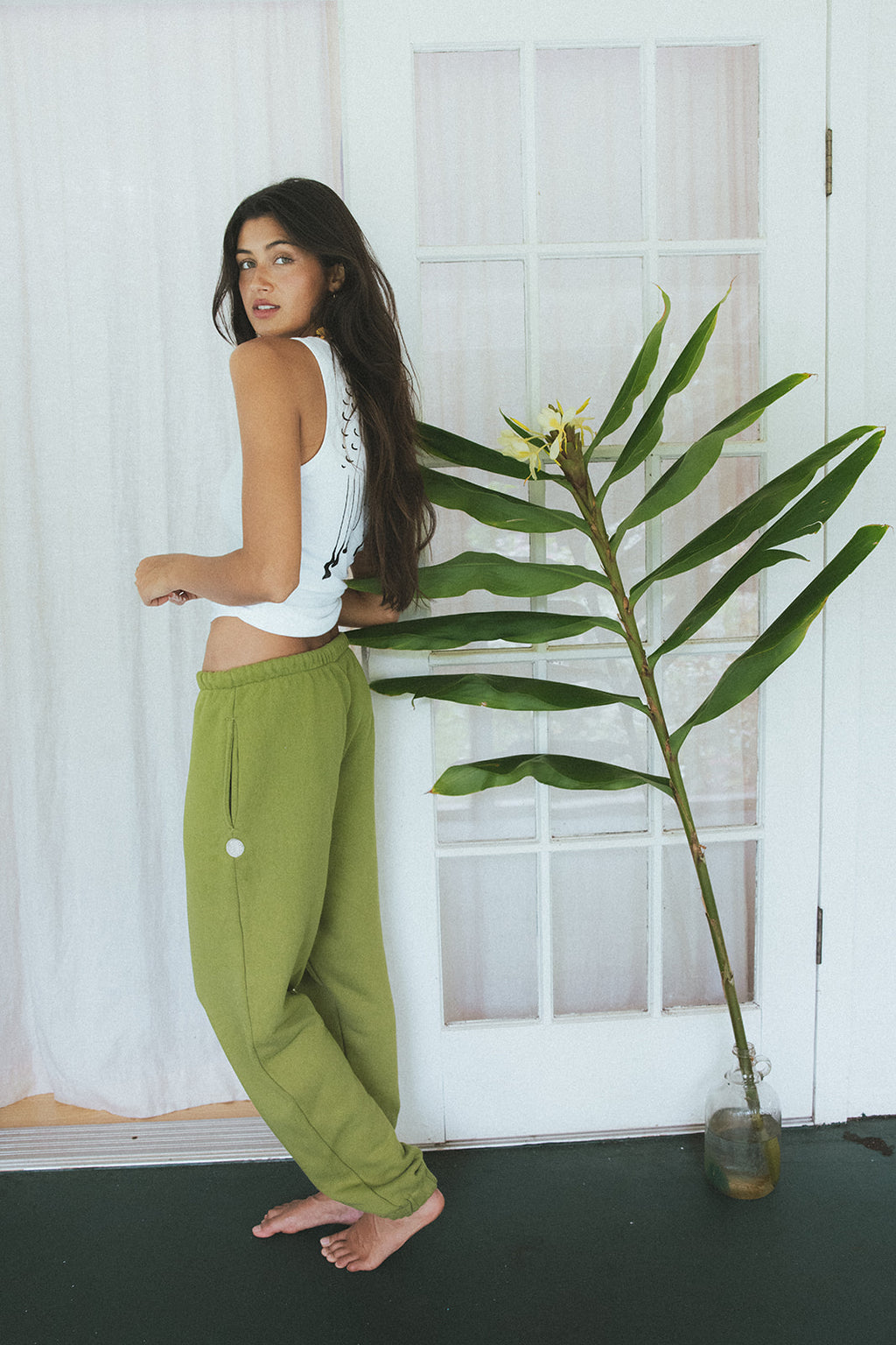 Wings Hawaii Green Joggers in 100% cotton. Designed in Maui, made in Los Angeles, USA. Small batch, sustainable, beach-inspired, elevated essentials. 