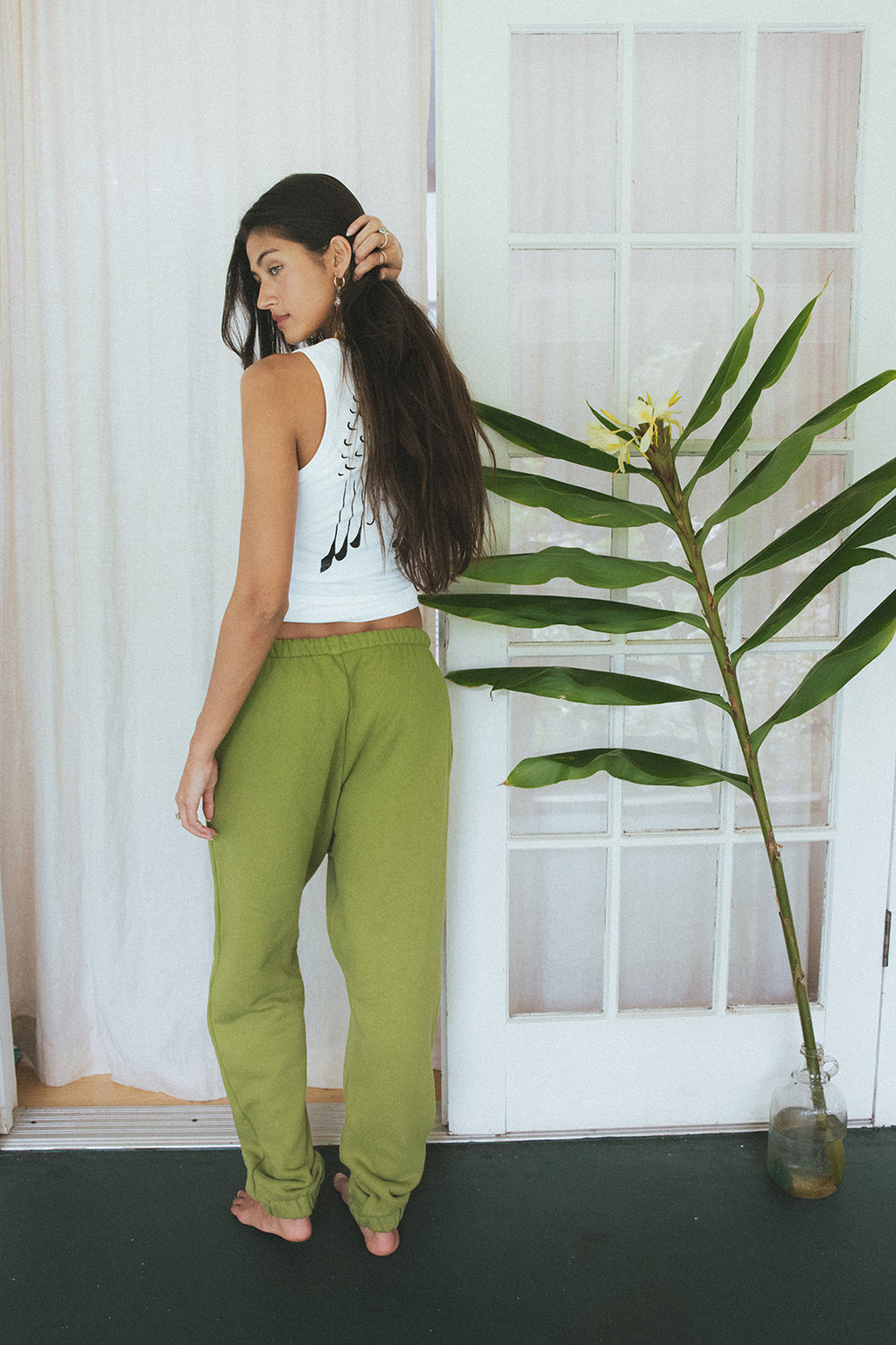 Wings Hawaii Green Joggers in 100% cotton. Designed in Maui, made in Los Angeles, USA. Small batch, sustainable, beach-inspired, elevated essentials. 