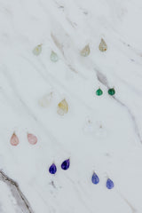 Wings Hawaii gemstone earring charms in sterling silver. Fine jewelry handcrafted in Maui. Varieties include Aquamarine, Black Sapphire, Emerald, Hackmanite, Herkimer, Labradorite, Moonstone, Pink Tourmaline, Peridot, Rutilated Quartz, or Sunstone. Made for Charm Bar mix match customize create your own designer luxury charm hoop earrings. 