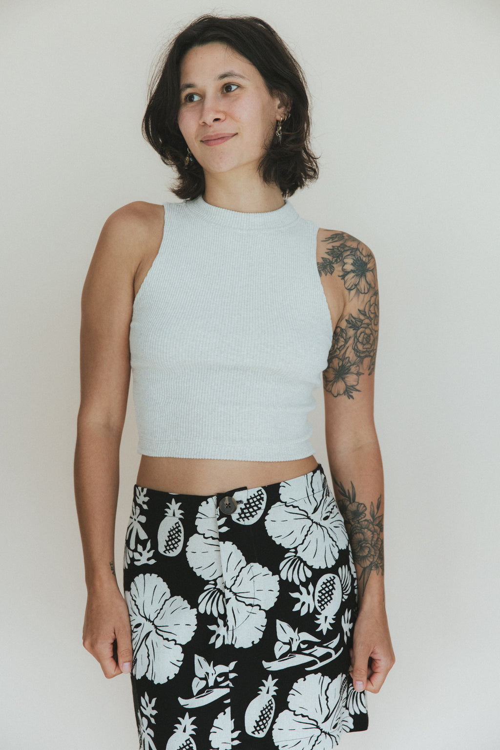 Wings Hawaii Ribbed Lexi Tank Top. Stretchy high neck cropped tank top in neutral Beige cream off-white. Perfect layering piece. Designed in Maui, sewn in Bali. Sustainable, small batch, boho beachy chic women's apparel.