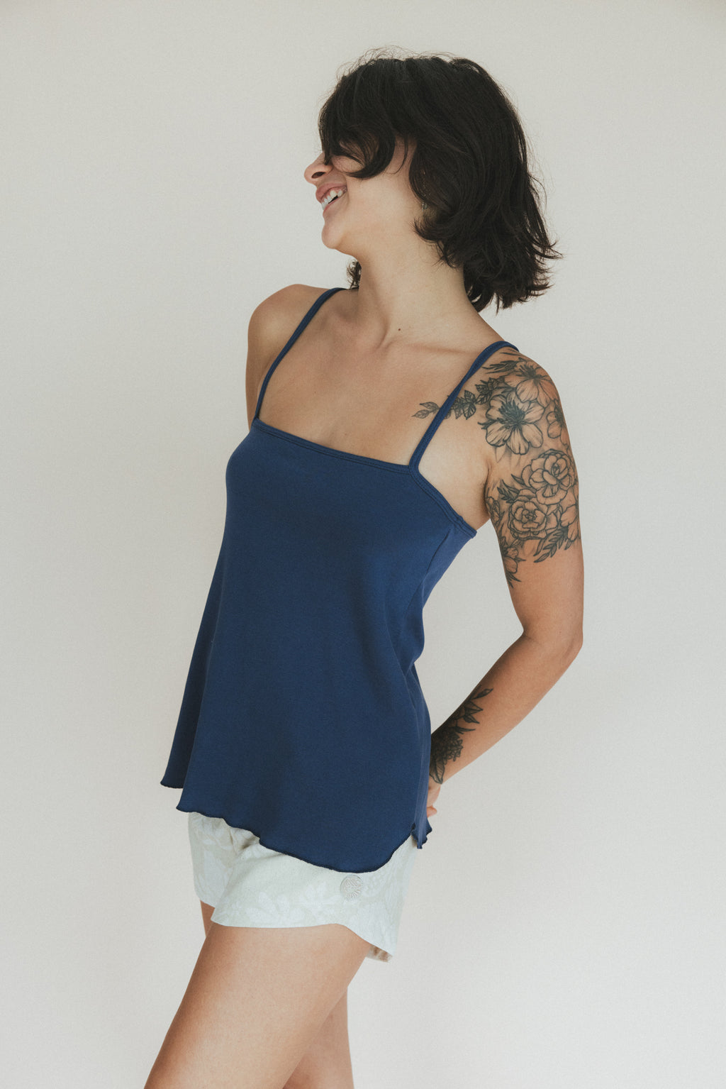 Wings Hawaii baby rib tank top in navy blue. Spaghetti straps and flowy, flattering shape. 100% cotton, designed in Maui. 