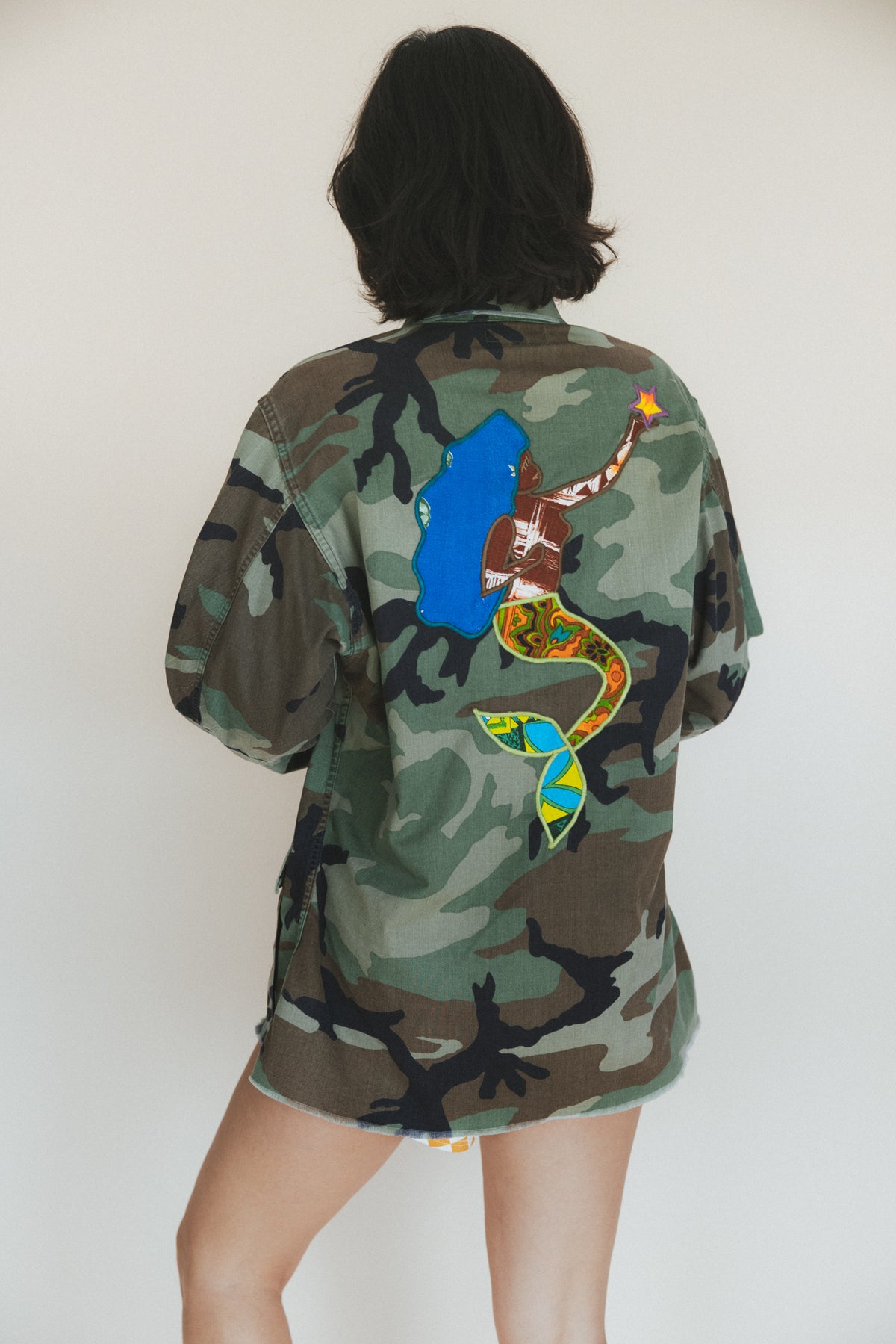 Wings Hawaii La Sirena mermaid army jacket. Handcrafted in Maui. Upcycled and hand-sewn with vintage aloha fabric. Small batch, sustainable fashion handmade in Hawaii.