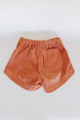 Wings Hawaii retro pocket shorts in coral orange corduroy. Back pocket thumbnail