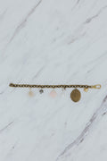 Wings Hawaii Vintage Charm Bracelet. Brass chain with mix of vintage charms, pink opal, pearls, and a locket. Fine jewelry handcrafted in Maui. 