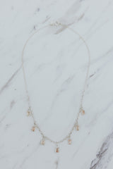 Wings Hawaii Supernova Charm Necklace. Seven Sunstones on sterling silver link chain. Glamorous statement necklace handmade in Maui. Fine jewelry gifts handcrafted in Hawaii.  thumbnail