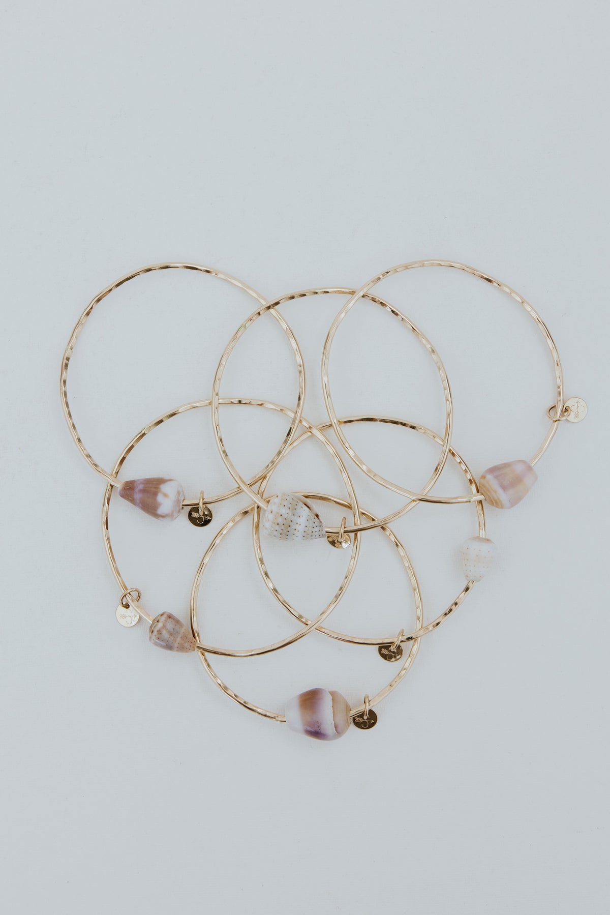 Ti Leaf Bangle - Cone Shell