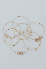 Ti Leaf Bangle - Triple Puka Shell thumbnail