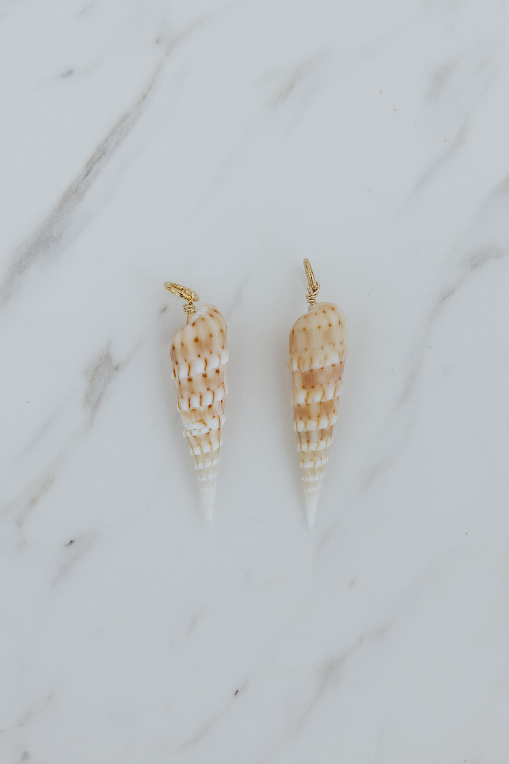Wings Hawaii Auger Shell charms for hoop earrings. Fine shell jewelry handmade with aloha in Maui. Elevated, modern beach jewelry handcrafted in Hawaii. 