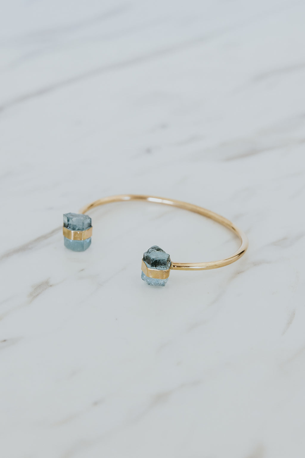 Wings Hawaii Aquamarine banded crystal cuff bracelet in 14k gold-filled. Fine jewelry handmade in Maui. Beachy boho chic ocean-inspired jewelry made in Hawaii. 