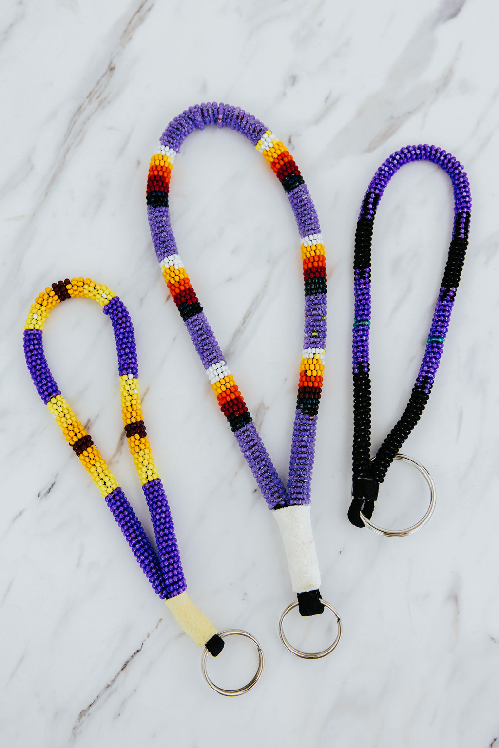 Wings Hawaii hand-beaded keychains. Colorful, chic bracelet-style loop keychains perfect for travel and great gifts