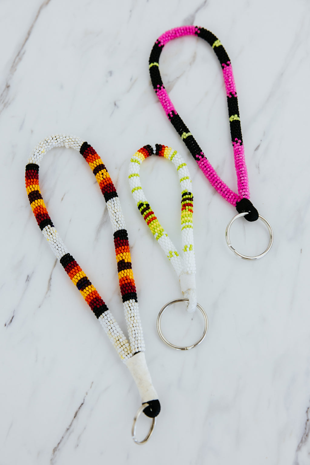 Wings Hawaii hand-beaded keychains. Colorful, chic bracelet-style loop keychains perfect for travel and great gifts