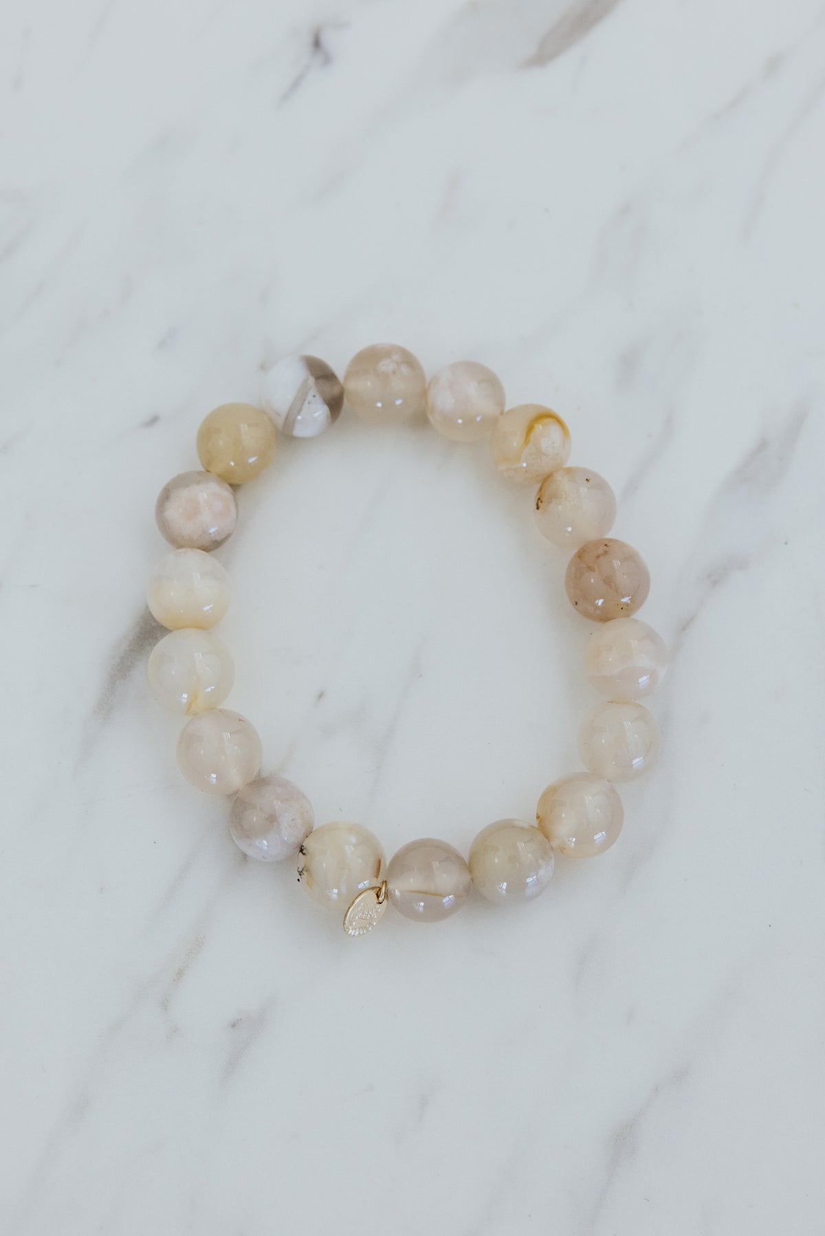 Wings Hawaii Sakura Agate stretchy beaded gemstone bracelet. Shop our Paia boutique for unique Hawaii jewelry gifts and Maui island souvenirs. 