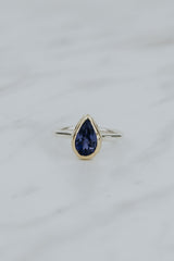 Wings Hawaii Teardrop Iolite gemstone ring. 3.24ct natural blue Iolite set in solid 14k yellow gold on a sterling silver  band. One of a kind. Fine jewelry expertly handcrafted in Maui.  thumbnail