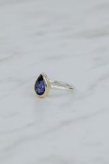 Wings Hawaii Teardrop Iolite gemstone ring. 3.24ct natural blue Iolite set in solid 14k yellow gold on a sterling silver  band. One of a kind. Fine jewelry expertly handcrafted in Maui.  thumbnail