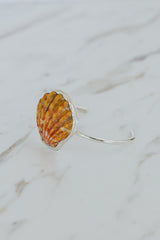 Wings Hawaii Sunrise Shell Cuff. Authentic Hawaiian beach shell on sterling silver bracelet. Fine jewelry handmade with aloha on Maui. One of a kind gifts made in Hawaii.  thumbnail