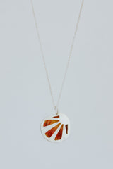 Wings Hawaii bezel-set Sunrise Shell necklace. Authentic, rare Hawaiian beach shell on sterling silver chain necklace. Fine jewelry handmade with aloha on Maui. One of a kind gifts made in Hawaii. thumbnail