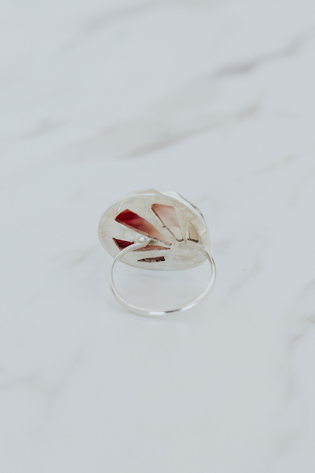 Wings Hawaii bezel-set Sunrise Shell ring bezel-set in sterling silver. Authentic, rare Hawaiian beach shell. Fine jewelry handmade with aloha on Maui. One of a kind gifts made in Hawaii.