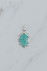Wings Hawaii bezel-set Arizona Turquoise necklace charm in sterling silver. Fine jewelry and modern charm necklaces handmade in Maui. 