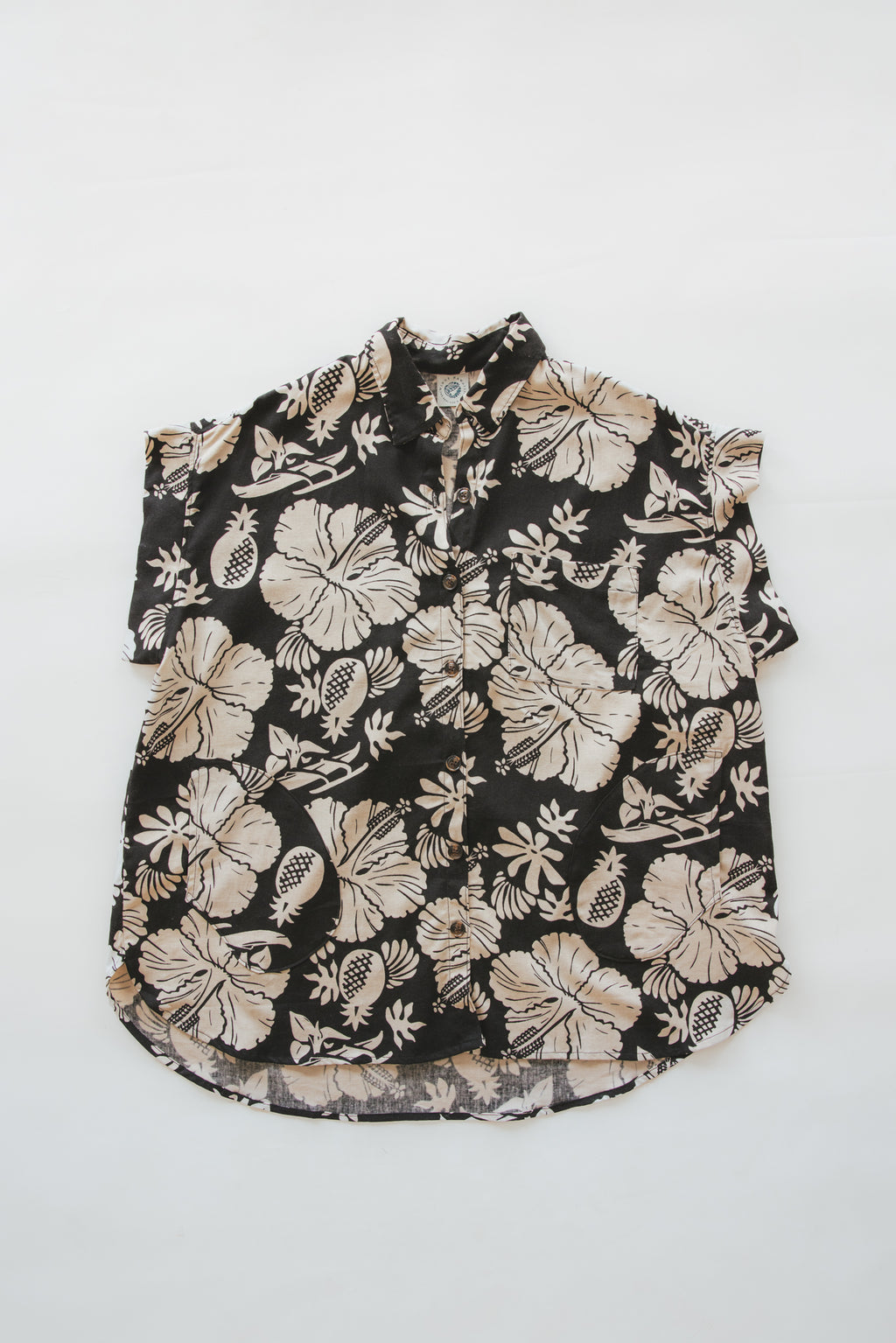 Wings Hawaii Short Sleeve Pocket Blouse in Hana Nightfall. Black and beige tropical Hawaiian print. Designed in Maui, sewn in Bali. Small batch, sustainable apparel. Modern beach chic women's apparel from Hawaii. 