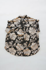 Wings Hawaii Short Sleeve Pocket Blouse in Hana Nightfall. Black and beige tropical Hawaiian print. Designed in Maui, sewn in Bali. Small batch, sustainable apparel. Modern beach chic women's apparel from Hawaii.  thumbnail
