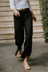 Wings Hawaii model wearing Pau Hana pants in classic black thumbnail