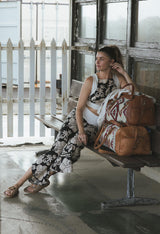Wings Hawaii pinafore crop top and pau hana pants in Hana Nightfall. Black and tan aloha print clothing handmade in Maui.  thumbnail
