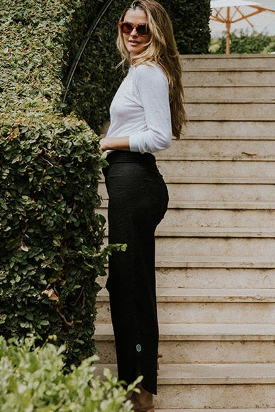 Wings Hawaii model wearing Pau Hana pants in classic black