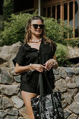 Wings Hawaii model wearing Classic Black Boxy Button-up thumbnail