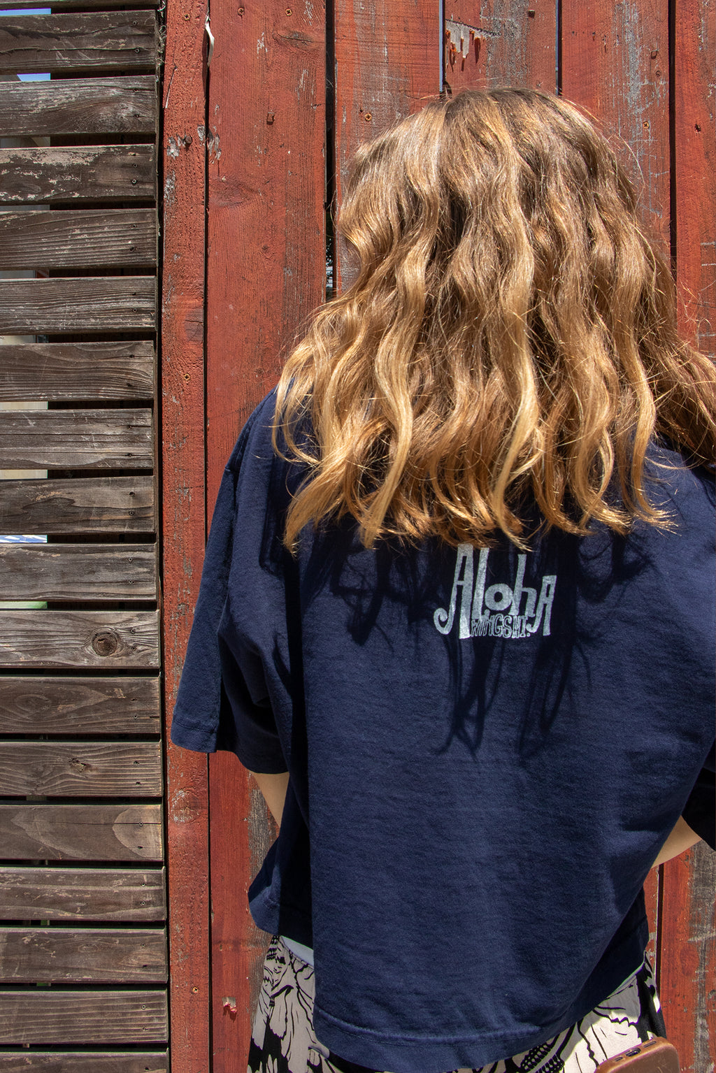 Wings Hawaii whale dance wide cropped tee in blue. Original humpback whale artwork designed and hand-printed in Maui. 