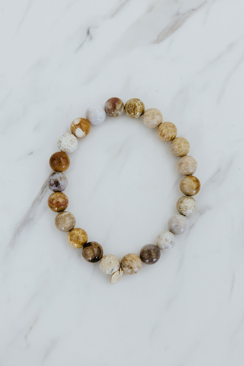 Wings Hawaii fossil coral stretchy bracelet. Boho-chic jewelry hand made in Maui. 