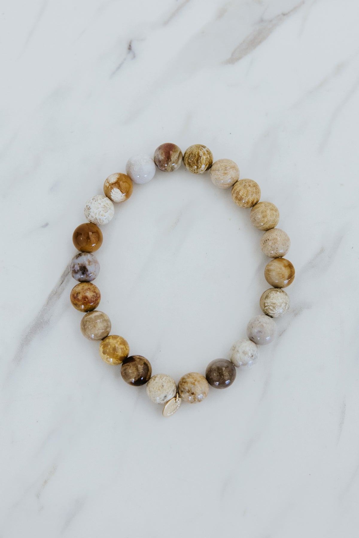 Wings Hawaii fossil coral stretchy bracelet. Boho-chic jewelry hand made in Maui. 