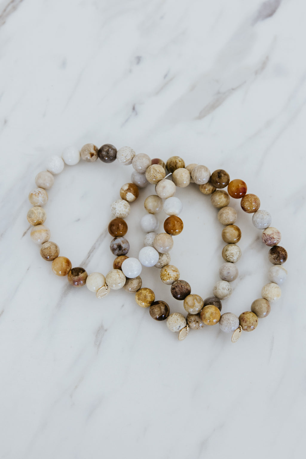 Wings Hawaii fossil coral stretchy bracelet. Boho-chic jewelry hand made in Maui. 